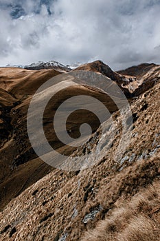 Rocky snow-capped mountain valley