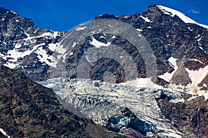 Rocky snow covered mountains and glacier near Simplon Pass, Switzerland