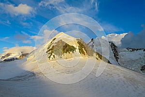 Castor and Pollux summit on Monterosa traverse knife edge snow ridge glacier walk and climb in the Alps