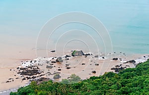 Rocky Soft Pastel Blue Beach Near The Forest. Calm and Serenity Blue Coastline. Tranquility in Difficulties