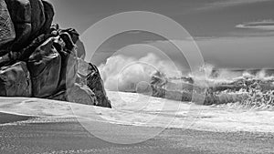 rocky stormy beach seaside with mountain. rocky beach seaside with water waves. rocky beach