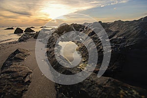 Rocky sunrise at Samila beach