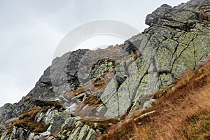 Rocky Tatra mountain tourist hiking trails under blue sky in Slovakia