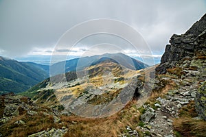 Rocky Tatra mountain tourist hiking trails under blue sky in Slovakia