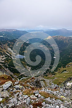 Rocky Tatra mountain tourist hiking trails under blue sky in Slovakia