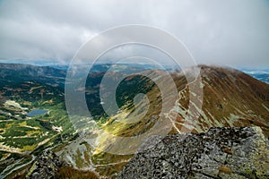 Rocky Tatra mountain tourist hiking trails under blue sky in Slovakia