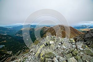 Rocky Tatra mountain tourist hiking trails under blue sky in Slovakia