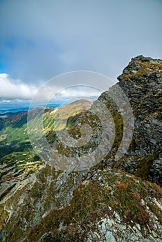 Rocky Tatra mountain tourist hiking trails under blue sky in Slovakia