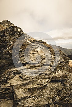 Rocky Tatra mountain tourist hiking trails under blue sky in Slovakia - vintage retro look