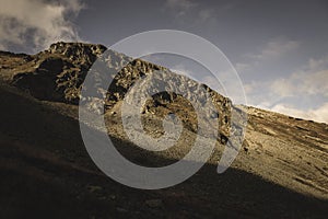 Rocky Tatra mountain tourist hiking trails under blue sky in Slovakia - vintage retro look