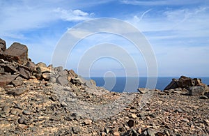 Rocky terrain on a background of sea and sky