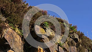 Rocky terrain formation against blue sky