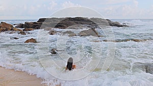 Rocky Tropical Beach with Tanned Woman in Bikini on Summer Weekend Vacation