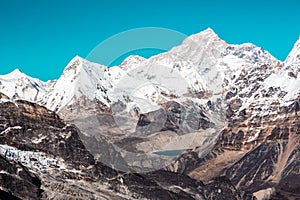 Rocky Valley snowy Mountain Peaks and Lake Panoramic View