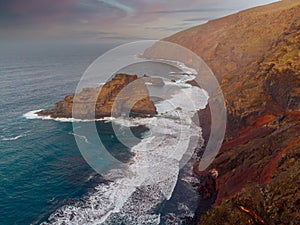 Rocky, volcanic beach and unsettled atlantic ocean. La Palma Island. Aerial view