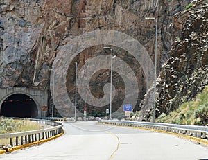 Rocky wall at the entrance to Shoshone Canyon tunnel which emerges to the Buffalo Bill dam in Wyoming