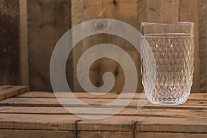 Rococo cristal glass on a wooden table