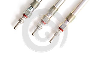 Rod ceramic glow plugs for a diesel engine on a white background, close-up, isolate. Heating element
