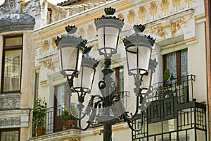 Rod iron street lamps of Avila Spain, an old Castilian Spanish village