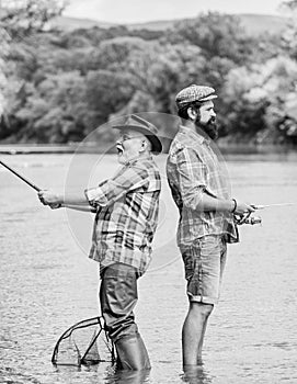 Rod and tackle. Fisherman fishing equipment. Fisherman grandpa and mature man friends. Fisherman family. Hobby sport