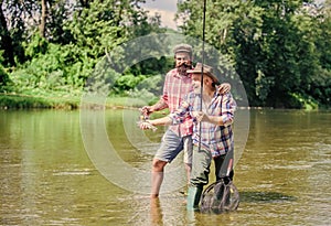 Rod tackle. Fishing equipment. Hobby sport. Fishing peaceful activity. Father and son fishing. Grandpa and mature man