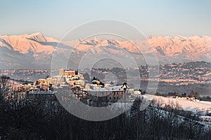 Roddi castle and mountains in northern italy, winter, langhe reg