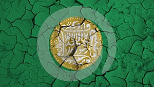 Rohingya flag on dry earth ground texture background.