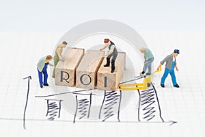 ROI, Return on Investment concept, miniature people figurines he