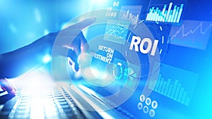 ROI - Return on investment, Trading and financial growth concept on virtual screen. photo