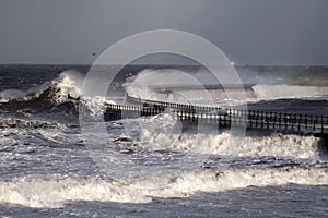 Roker Lighthouse and pier photo