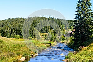 Roklandsky brook in the village Modrava, in early autumn in Sumava National Park, Czechia, Europe