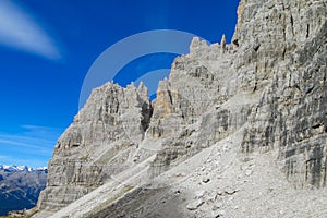 Roky cliff mountain towers and walls in Dolomites Alps