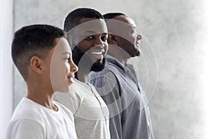 Role of Men In Families. Black Man Posing With Son And Father