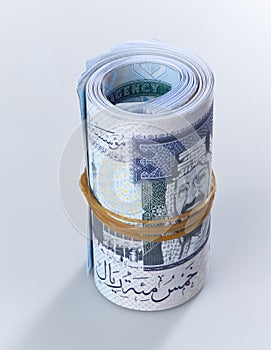 A roll of 500 Saudi Riyal Banknotes isolated #1