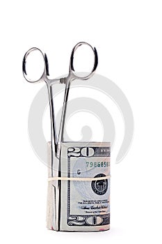 Roll of American money and forceps