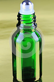 Roll-on applicator on a Essential health oil bottle