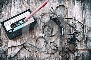 Roll audio tape pencil vintage background