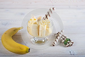 Roll of banana ice cream. Fresh fried fruit ice cream, ice roll