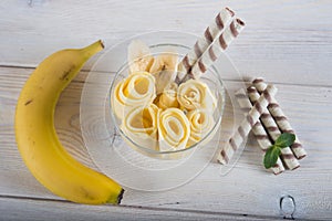 Roll of banana ice cream. Fresh fried fruit ice cream, ice roll