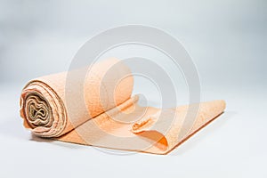 A roll of bandages roll as the white background.