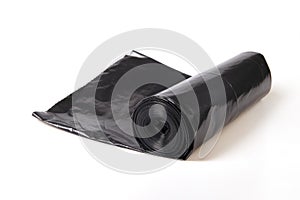 Roll of black plastic polyethylene sheeting isolated on white