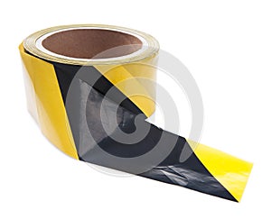 Roll of black yellow caution tape isolated