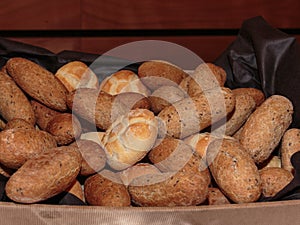 Roll Bread Heap and Wholemeal Rolls inside Box