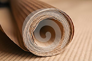 Roll of brown corrugated cardboard, closeup view