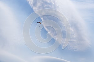 Roll cloud sky and paraglider