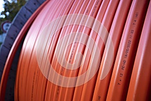 Roll of conduits for underground fiber optic cables