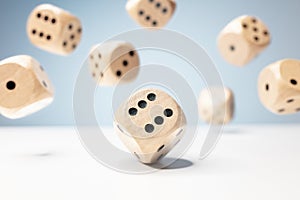 Roll the dice, throwing and rolling wooden dice on a blue background