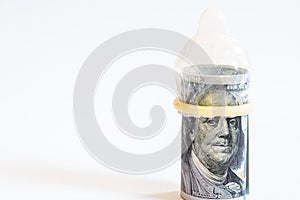 roll of 100 dollar banknotes in condome