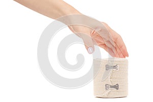 Roll elastic bandage in hand