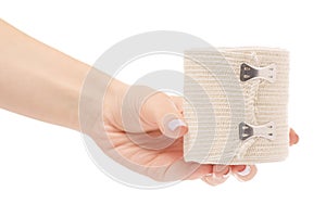 Roll elastic bandage in hand